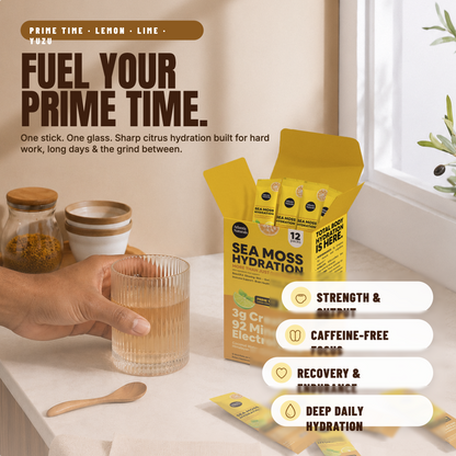 A person holds a glass of prepared drink beside an open box of Sea Moss Hydration sticks on a kitchen counter, with text callouts about strength, focus, recovery, and daily hydration. The product packaging is yellow and black, and the scene includes jars and a spoon as props. prime time