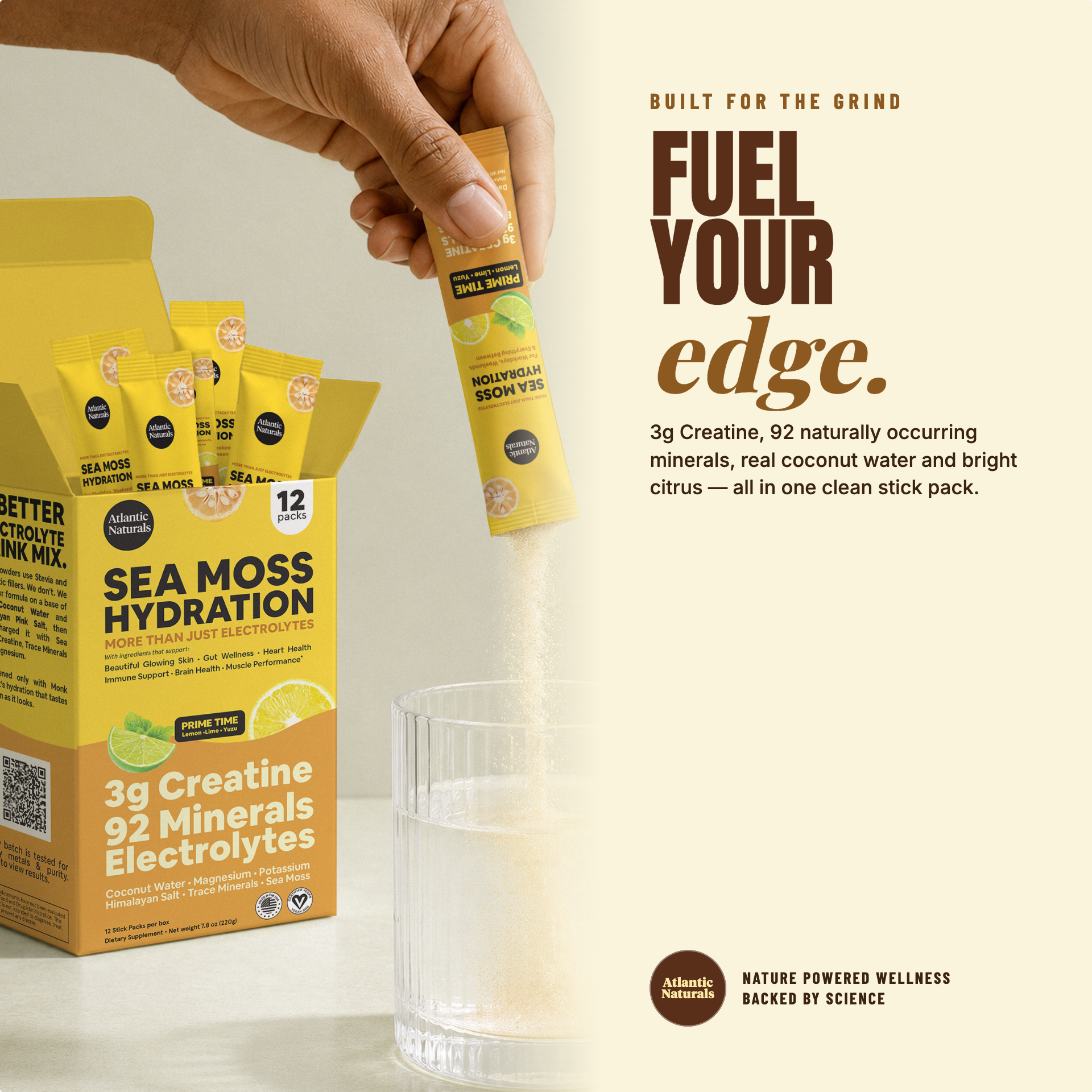 A hand holds a yellow Sea Moss Hydration stick pack above a glass of clear liquid, with a matching yellow and orange product box and several stick packs visible on the left. Large promotional text appears on the right on a light cream background. prime time